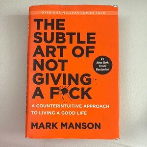 The Subtle Art of Not Giving a F*ck by Mark Manson - Orange